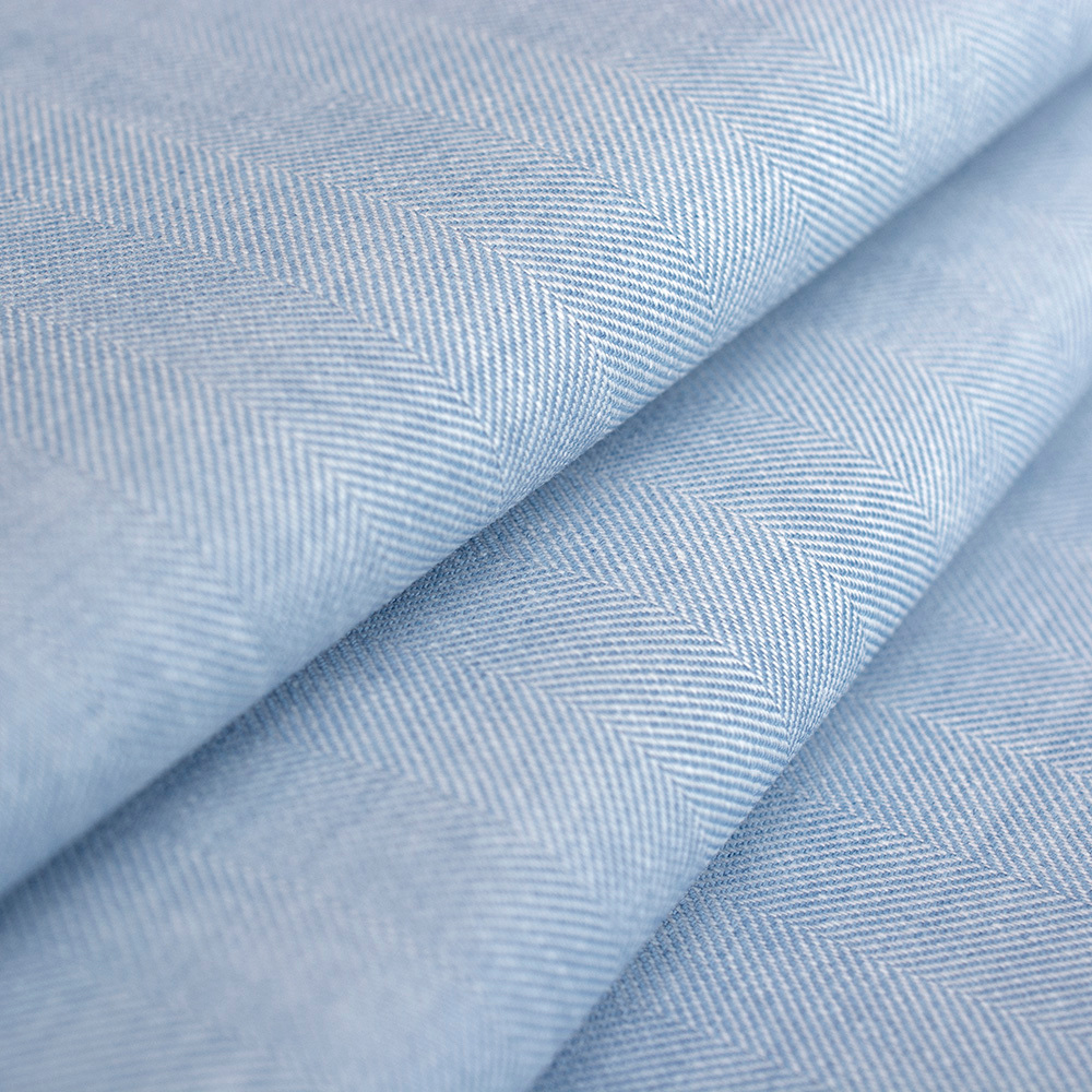 Tkanina bawełniana w jodełkę to idealny wybór dla osób, które cenią modę łączącą styl i wygodę.