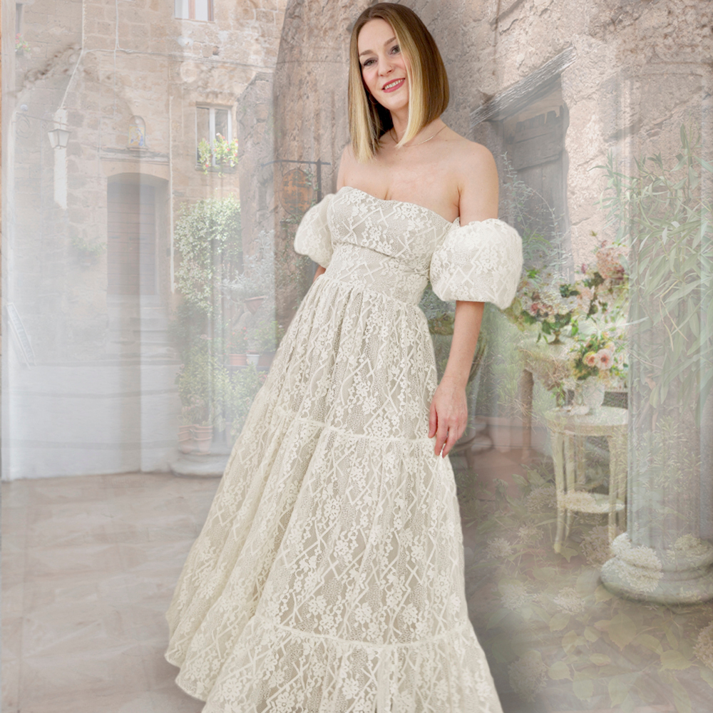 Koronka Roma to wysokiej jakości tkanina o eleganckim charakterze, wykonana z dodatkiem naturalnych włókien, które podnoszą jej komfort noszenia.