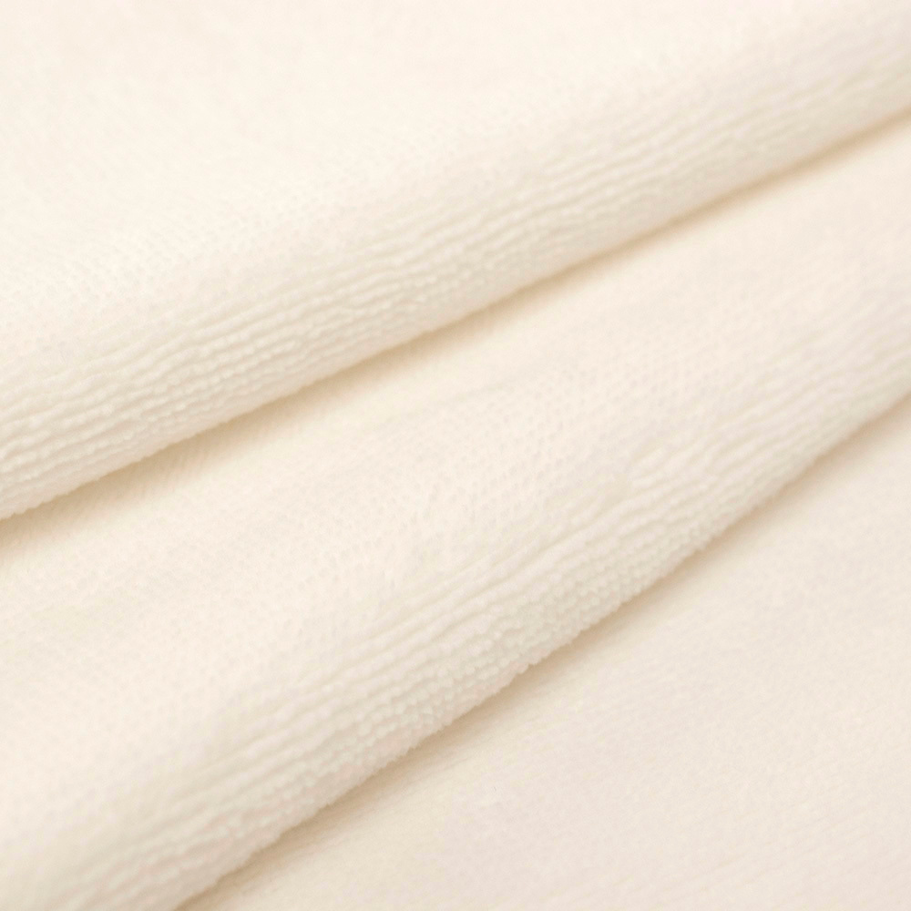 Tkanina Frotte wykonana z mieszanki włókien bawełnianych oraz bambusowych.