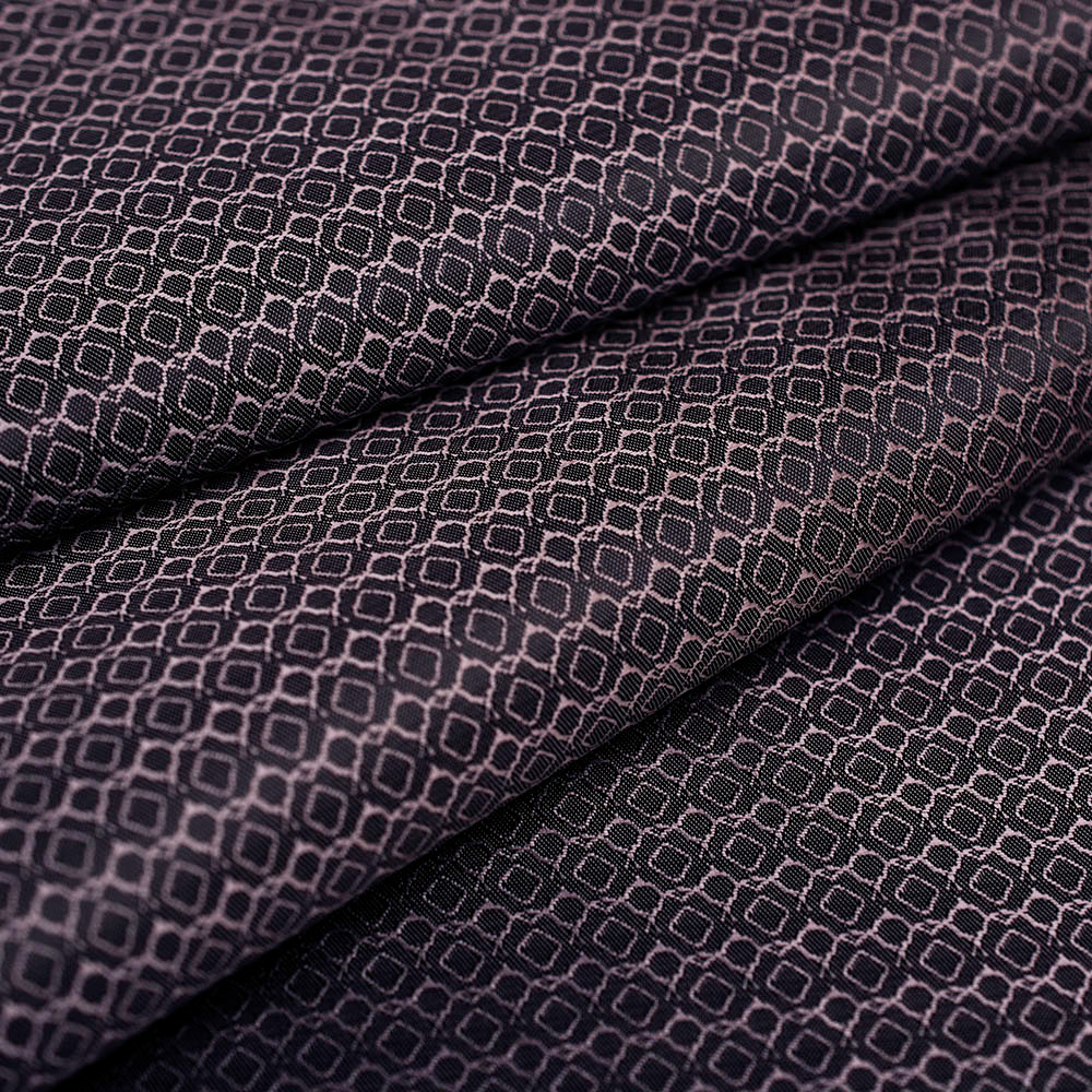 Wzorzysta podszewka żakardowa wykonana z włókien wiskozowych.