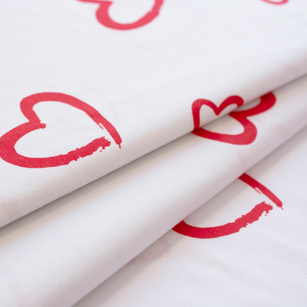 Tkanina bawełniana o splocie płóciennym, wyprodukowana w Polsce.