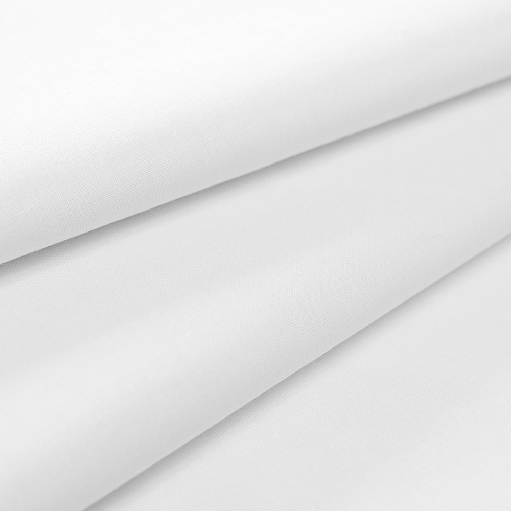 Tkanina bawełniana o splocie płóciennym, wyprodukowana w Polsce.