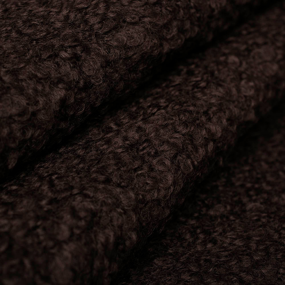 Dzianina płaszczowa Bukle Venus to wyjątkowy materiał stworzony z myślą o jesienno-zimowej odzieży wierzchniej.