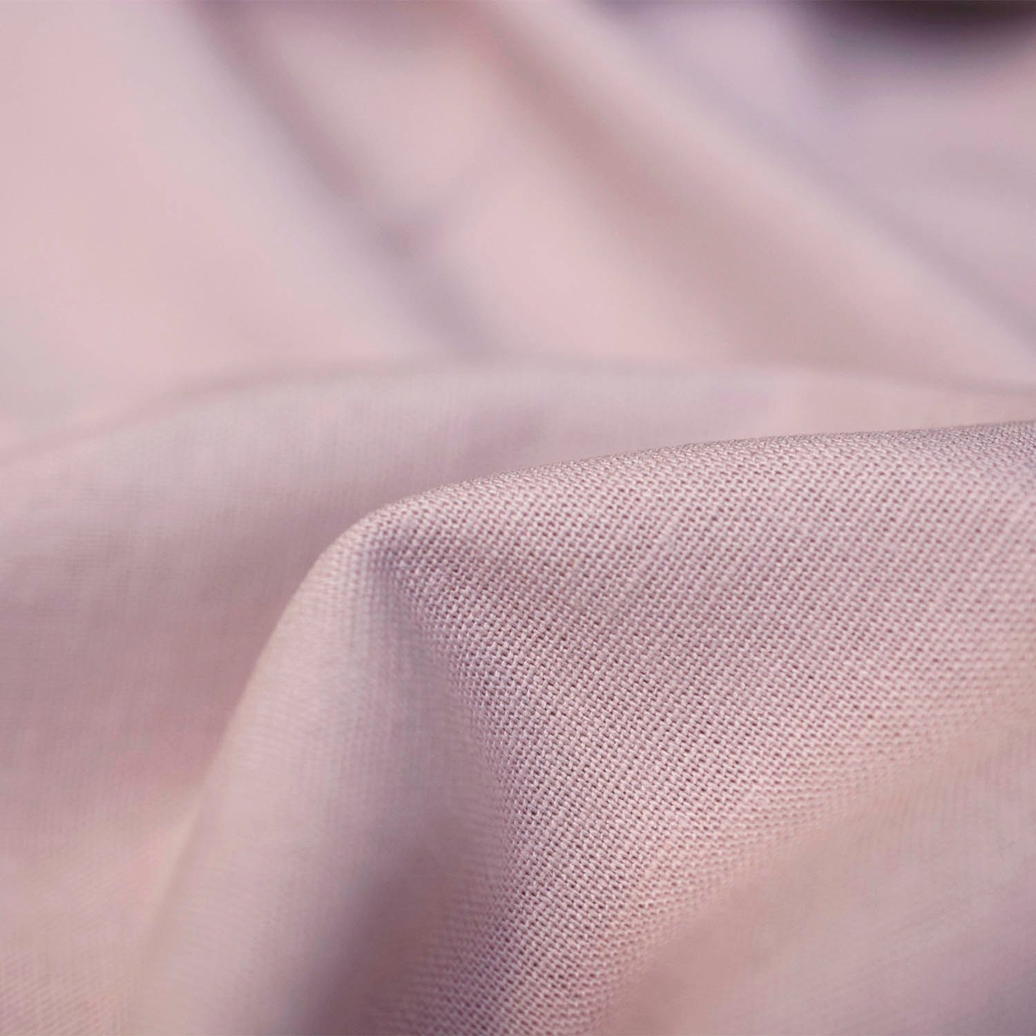 Tkanina lniana o jednolitym zabarwieniu, idealna na wiosenną letnią odzież.