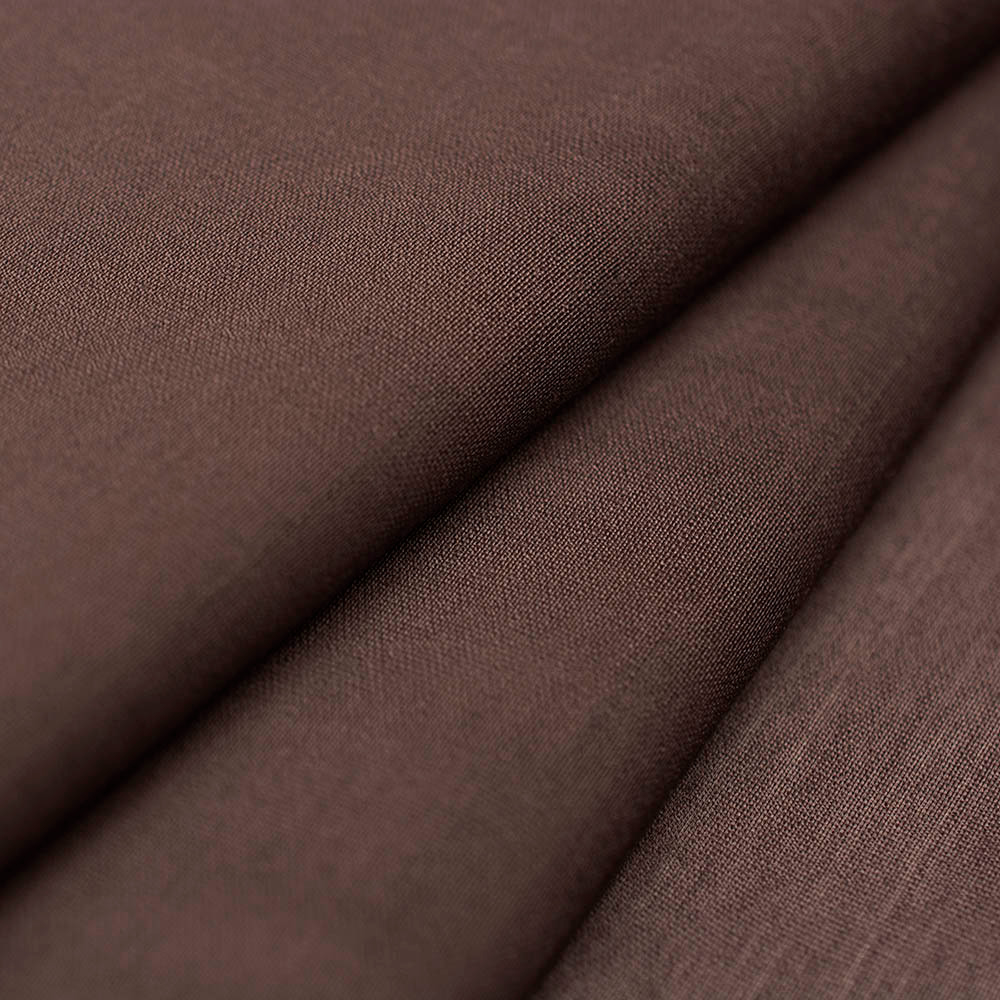Tencel Capri to ekskluzywna tkanina, która łączy w sobie piękno i praktyczność na najwyższym poziomie.