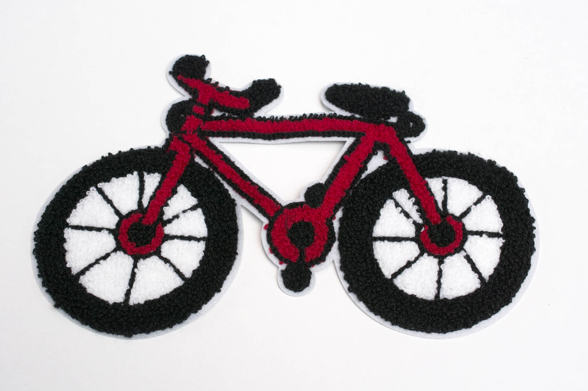 
	Haftowana naszywka Red Bike, o wymiarach 24cm x 15cm.