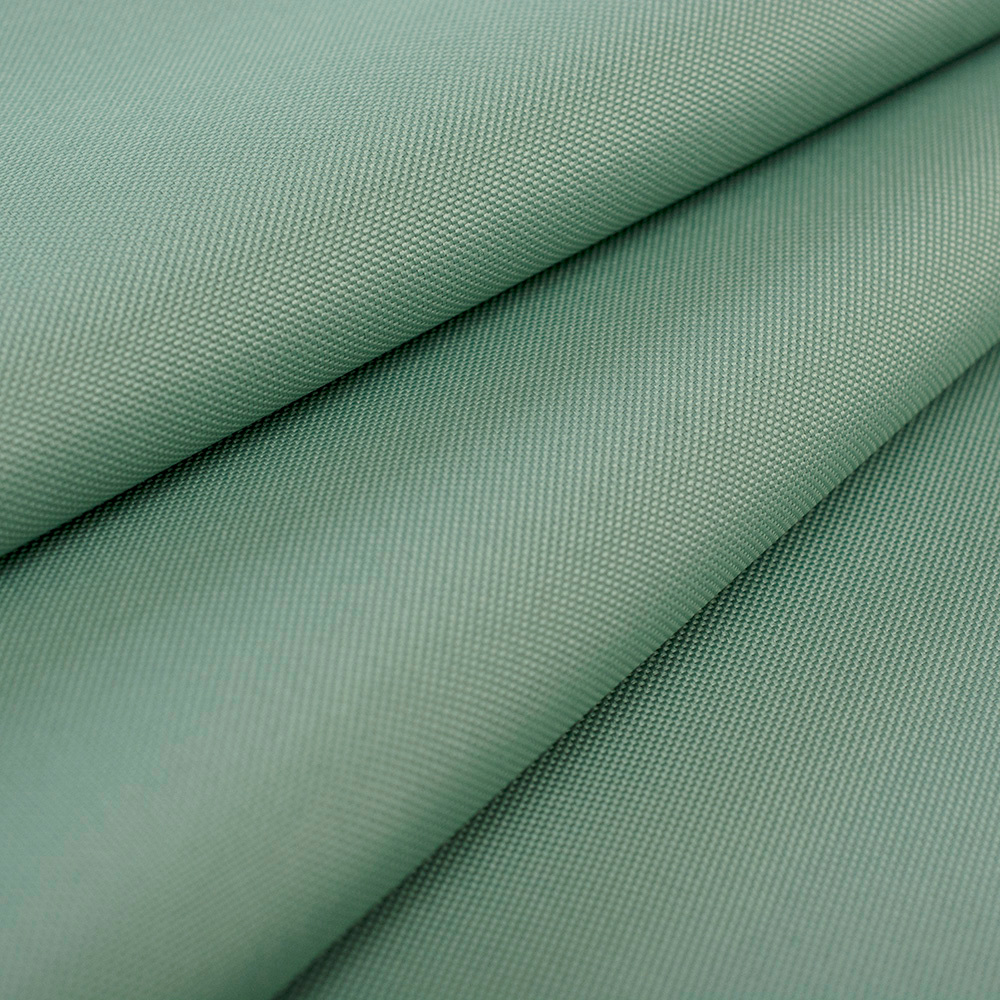 Tkanina markizowa o właściwościach wodoodpornych i wiatroodpornych.