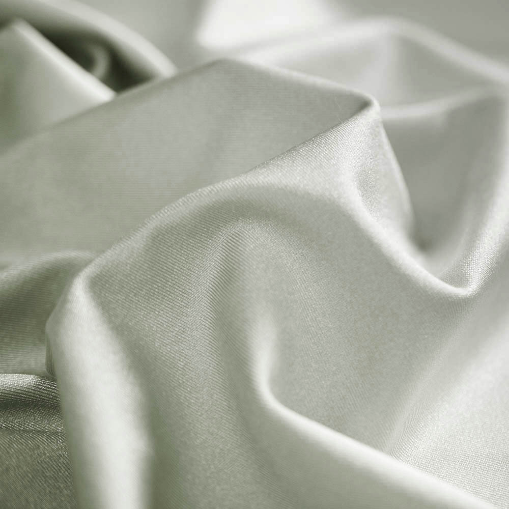 Dzianina typu Lycra to wysokiej jakości materiał o jednolitym kolorze, który zachwyca wyjątkową elastycznością – rozciąga się w obu kierunkach, zapewniając idealne dopasowanie i komfort noszenia.