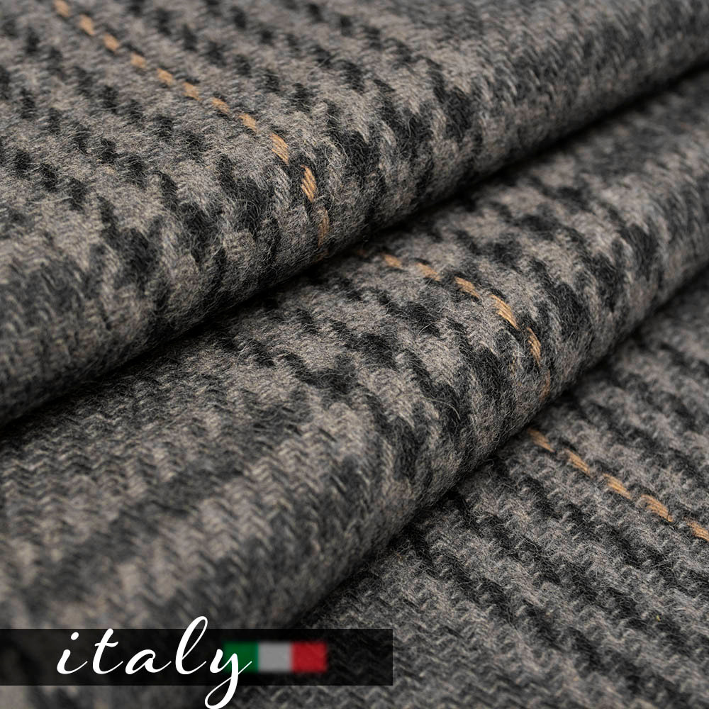 Elegancka tkanina płaszczowa wykonana z wysokiej jakości wełny to doskonały wybór na sezon jesienno-zimowy.