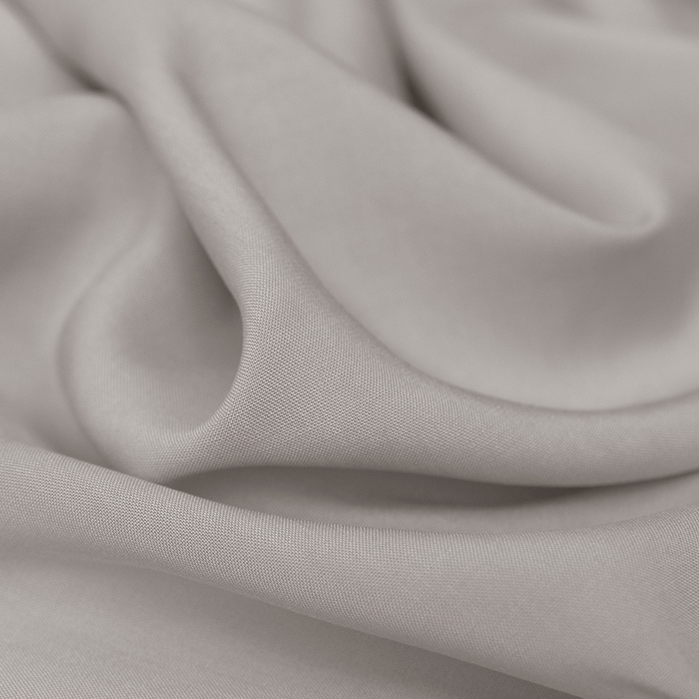 Tkanina wiskozowa o splocie płóciennym, wykonana z wysokiej jakości włókien.