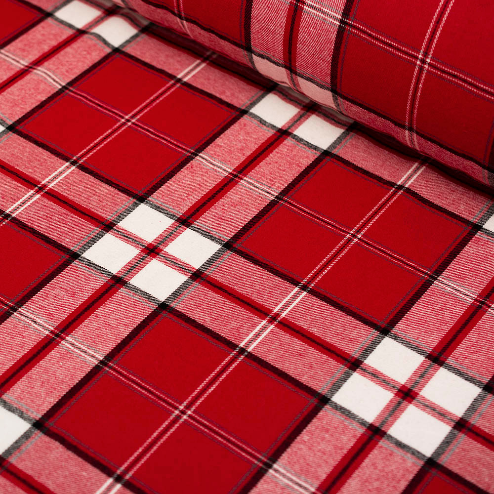 Miękka flanela wykonana z połączenia włókien bawełnianych i syntetycznych, w modnym wzorze kraty.