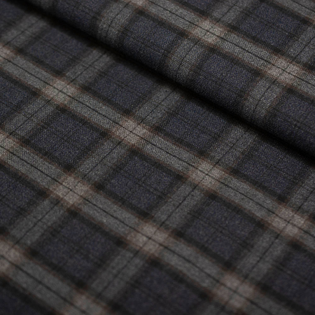 Tkanina w kratę o ponadczasowym charakterze, doskonała do tworzenia eleganckich i wygodnych ubrań.