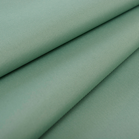 Tkanina markizowa o właściwościach wodoodpornych i wiatroodpornych.