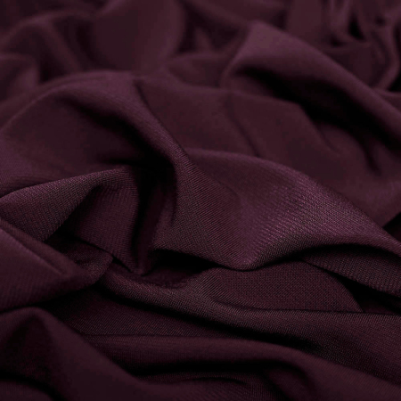 Dzianina elastyczna typu ITY – Super Jersey, wykonana z wysokiej jakości włókien syntetycznych.