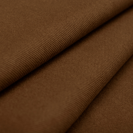 Jeansowa tkanina bawełniana wyróżnia się diagonalną fakturą i jednolitym kolorem.