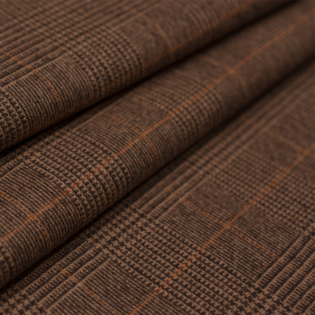 Elegancka tkanina wełniana o wysokiej jakości, wykonana z połączenia włókien naturalnych i syntetycznych.