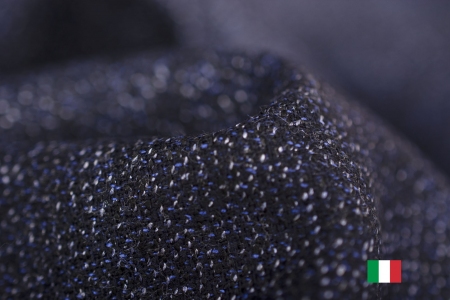 Włoska tkanina garniturowa wykonana z wysokiej jakości włókien.