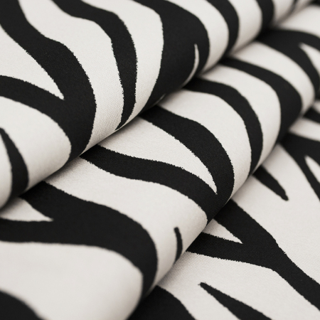 Bawełniana tkanina wykonana z wysokiej jakości naturalnych włókien z dodatkiem elastanu.