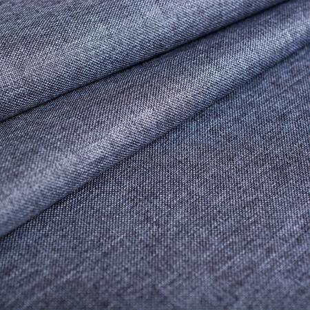 Tkanina markizowa w kolorze melanżowym, o właściwościach wodoodpornych i wiatroodpornych.