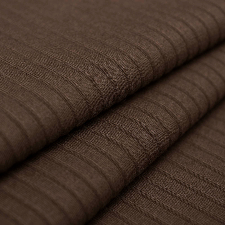 Dzianina RIB to bawełniana dzianina o charakterystycznej fakturze wąskiego prążka, wykonana z naturalnych włókien.