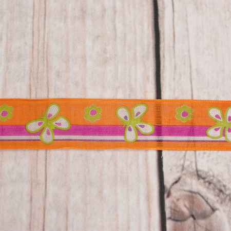 Świąteczna taśma atłasowa w kolorze pomarańczowym z motywem motyli.