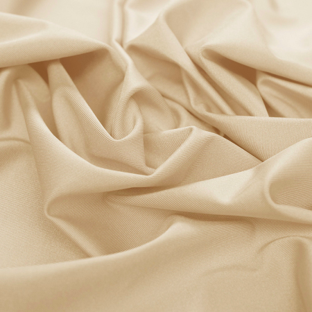 Dzianina typu Lycra to wysokiej jakości materiał o jednolitym kolorze, który zachwyca wyjątkową elastycznością – rozciąga się w obu kierunkach, zapewniając idealne dopasowanie i komfort noszenia.