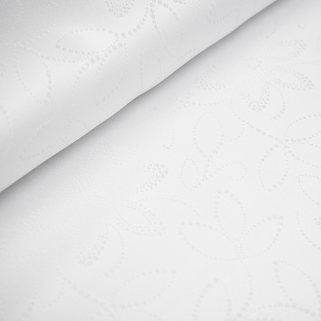 Tkanina obrusowa biała, wykonana z wysokiej jakości, mocno skręconych włókien poliestrowych, z dodatkiem metalicznej nici.