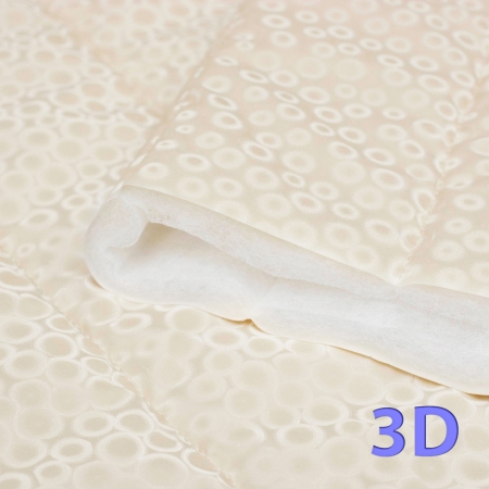 Pikowa tkanina w kolorze kremowym, z efektem 3D.