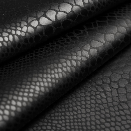 Dzianina Viper to materiał o wyrazistym wzorze inspirowanym fakturą wężowej skóry, dodający stylizacjom drapieżnego charakteru.