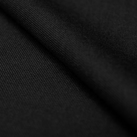 Wool Prada to materiał o jednolitej strukturze i klasycznym wykończeniu.