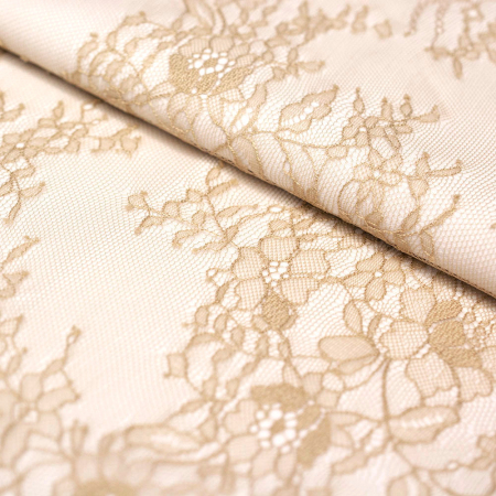 Koronka Floris to delikatna i lekka tkanina z subtelnym motywem kwiatowym.