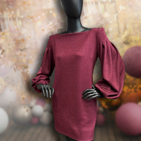 Dzianina Mohito Metalic to stylowy materiał swetrowy o wyjątkowym charakterze, wzbogacony subtelną metaliczną nicią.