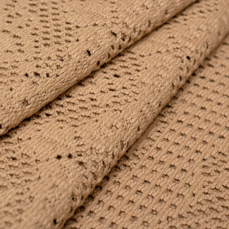 Ażurowa koronka z miękkiej, przyjemnej w dotyku bawełny o jednolitym kolorze.