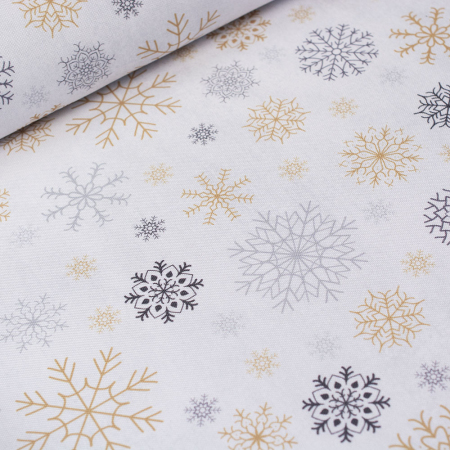 Wzorzysta tkanina dekoracyjna w pięknym, świątecznym wzorze.