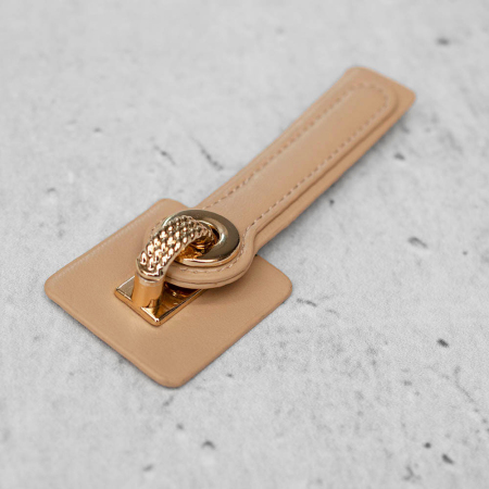 Eleganckie, ozdobne zapięcie wykonane z metalu i ekologicznej skóry.