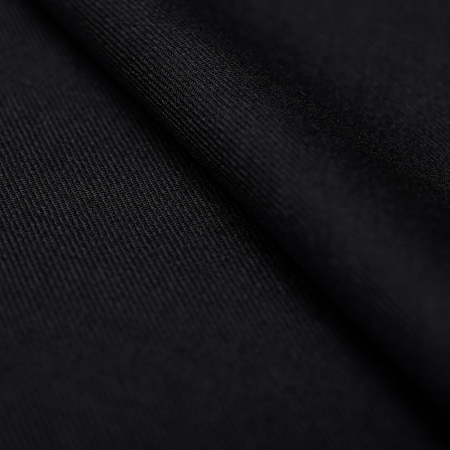 Wool Prada to materiał o jednolitej strukturze i klasycznym wykończeniu.