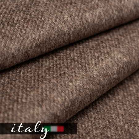 Tkanina Modena Diagonal to wysokiej jakości wełna o wyrazistym, ukośnym prążkowaniu, które nadaje projektom dynamiczny i nowoczesny charakter.