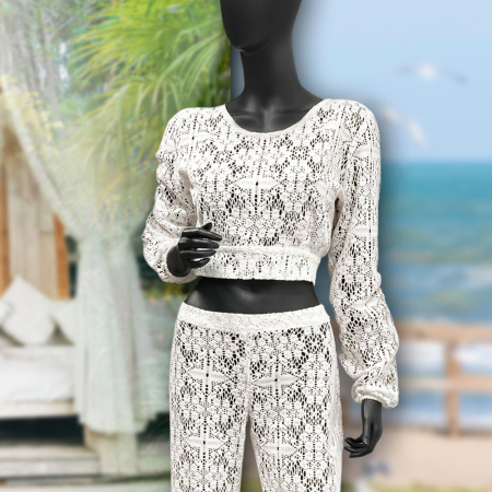 Ażurowa koronka bawełniana o jednolitym zabawieniu.