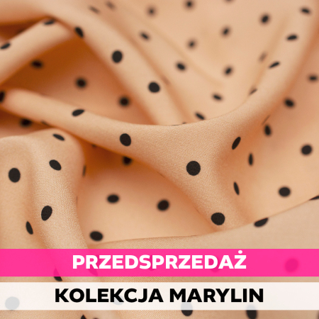 Tkanina z 100% wiskozy to lekki, miękki materiał, który pięknie układa się na sylwetce, tworząc naturalne fałdy i swobodny ruch.
