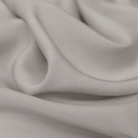 Tkanina wiskozowa o splocie płóciennym, wykonana z wysokiej jakości włókien.