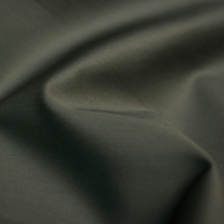 Bawełniana tkanina koszulowa o jednolitym zabarwieniu.