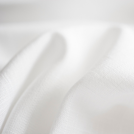 Tkanina lniana z dodatkiem włókien wiskozy oraz dużą zawartością lycry.